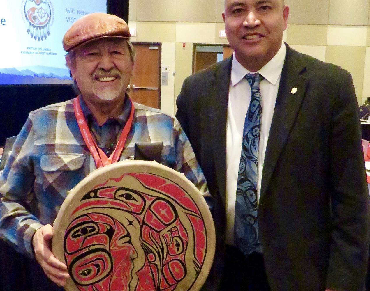 BCAFN Regional Chief Terry Teegee honouring Commissioner Dr. Ronald Ignace